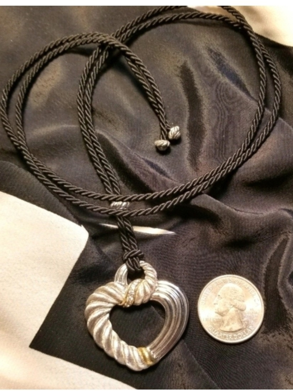 Twisted Heart Pendant Necklace in Silver and Gold-Tone on Black Cord
